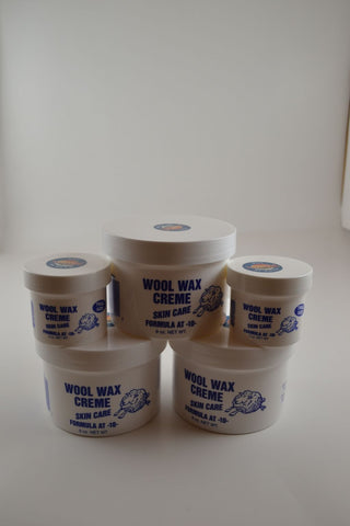 3 Nine ounce jars and 2 two ounce jars Wool Wax Creme